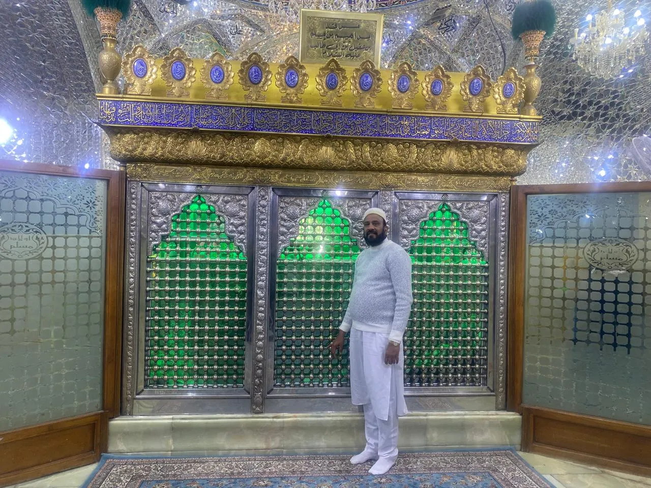 Man praying inside Karbala shrine