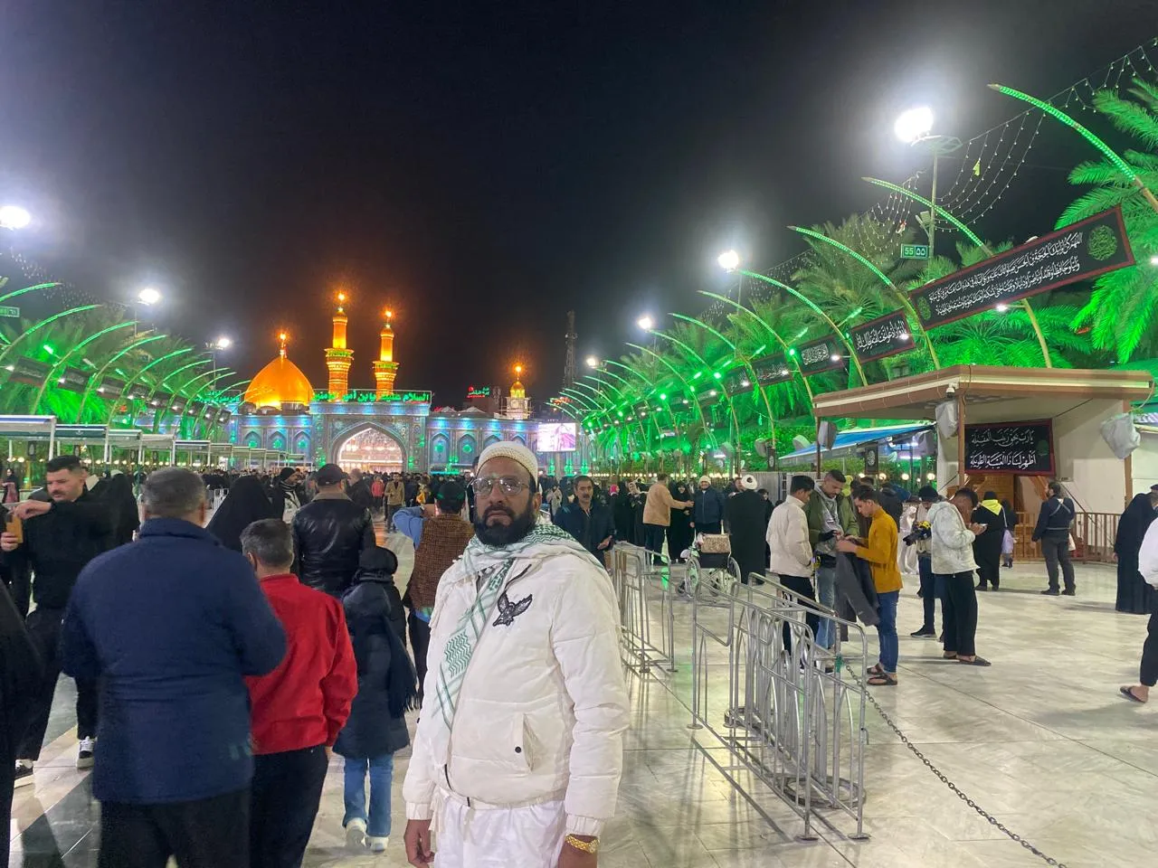 Illuminated Karbala walkway at night