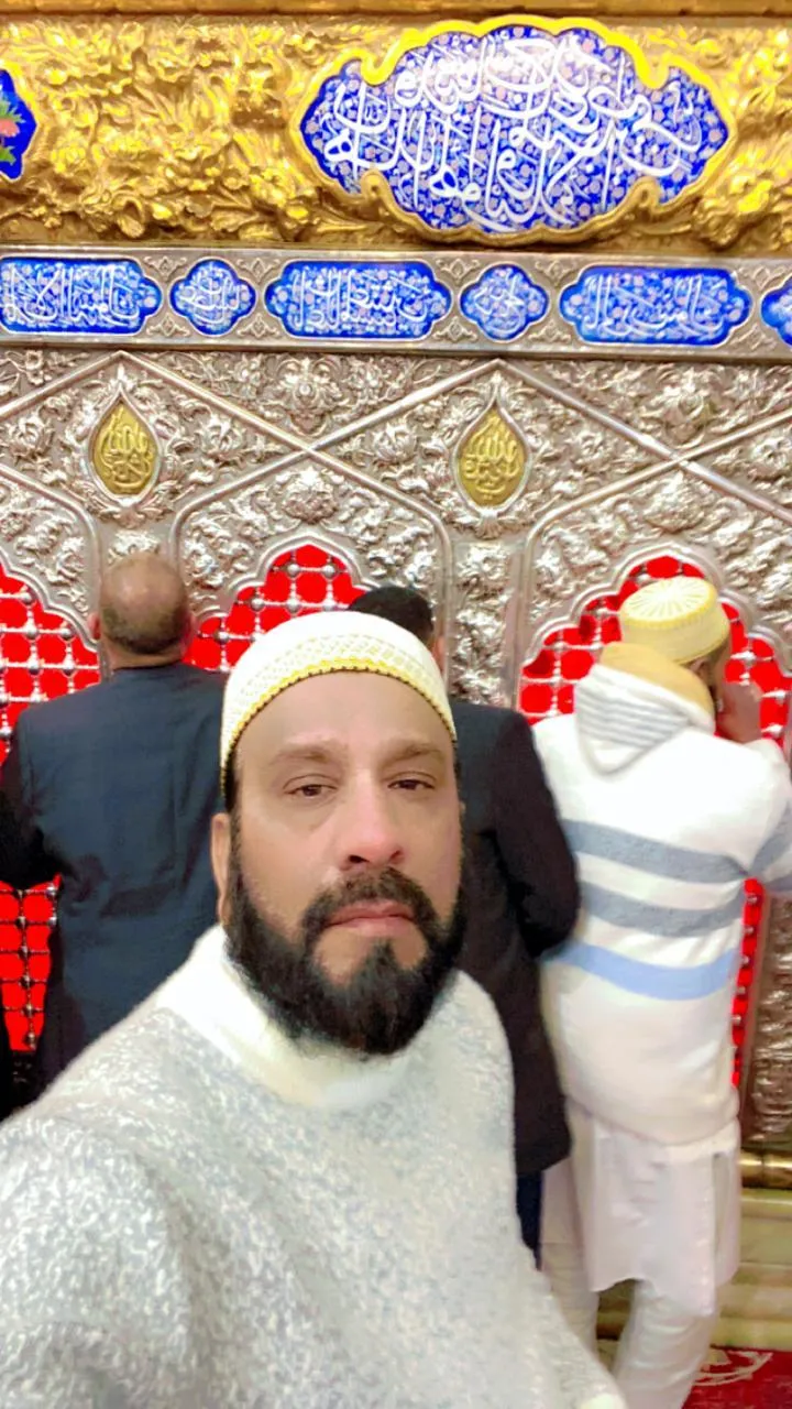 Smiling pilgrim inside shrine