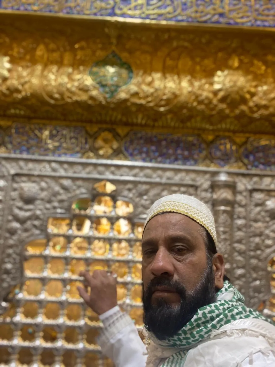 Close-up portrait with golden shrine background