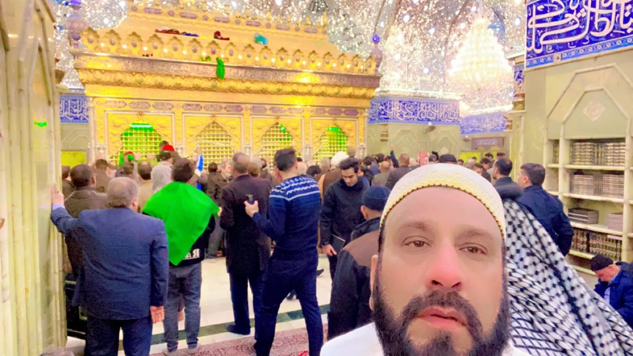Visitors at the entrance of Karbala shrine
